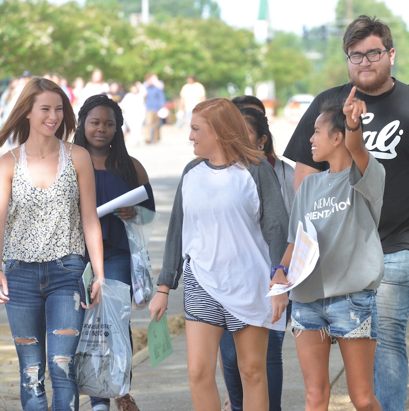 Photo of students enjoying a walk down the boulevard.