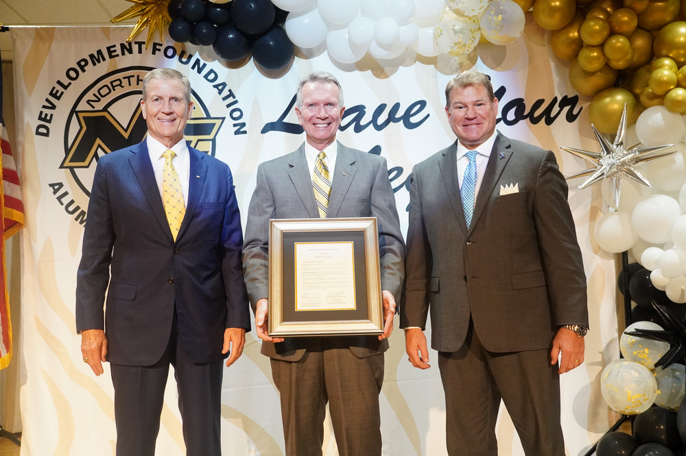  alumni hall of fame inductee mike staten with president dr. Ricky ford and Patrick Eaton