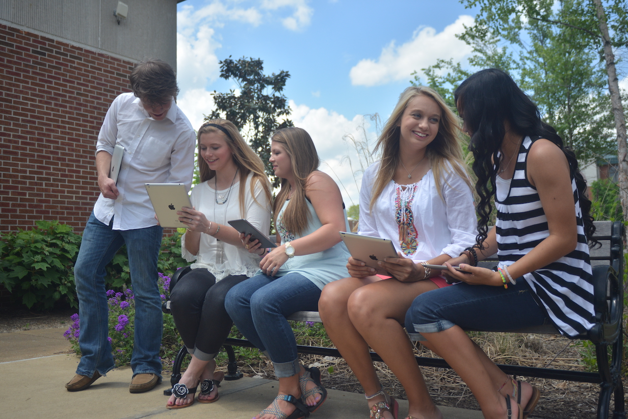 Photo of Students using iPads for Learning