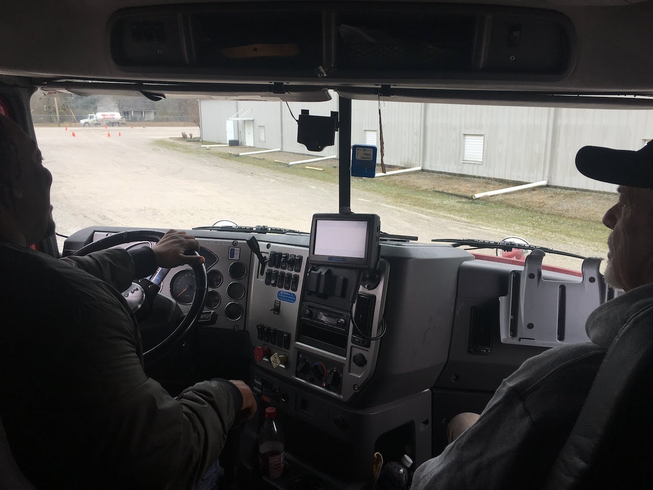 Photo of Driver and Instructor for the Truck Driving Academy