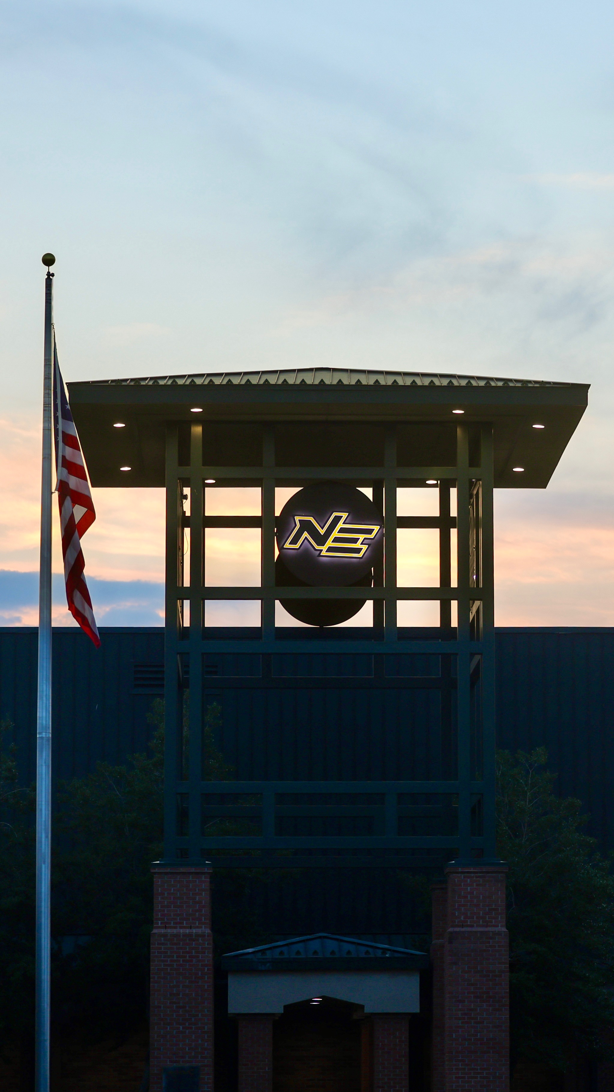 NEMCC Clock tower with a sunset background