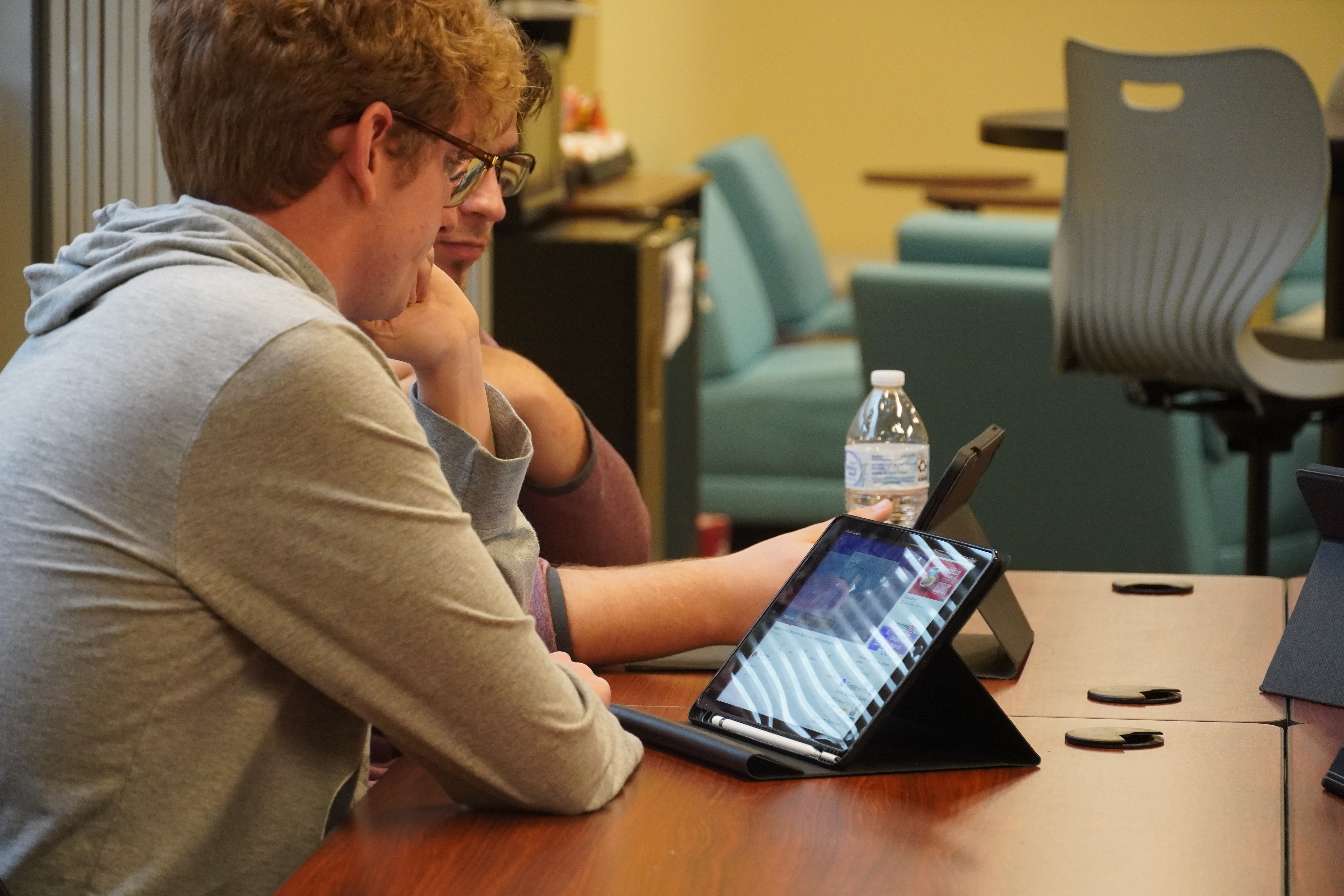 Students studying with iPad